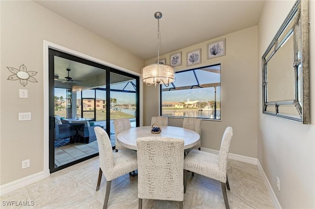 dining area featuring a chandelier