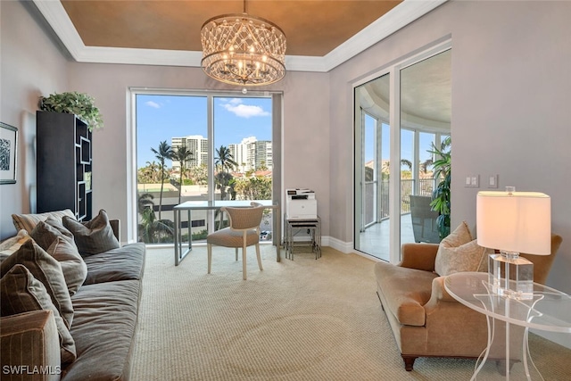 interior space with ornamental molding, a notable chandelier, and baseboards