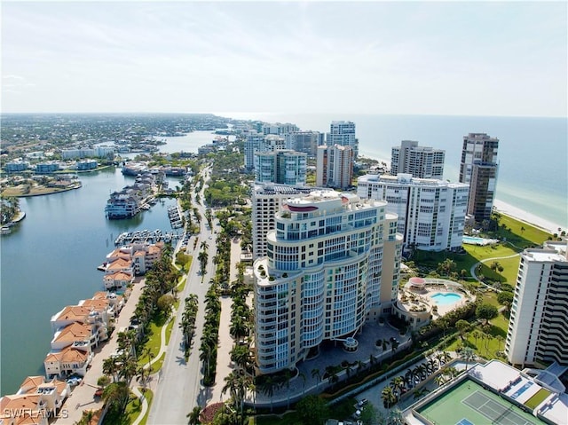 birds eye view of property featuring a water view