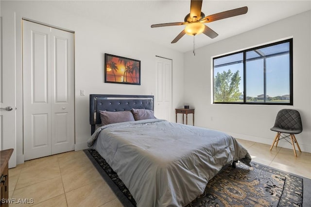 bedroom featuring ceiling fan and light tile patterned floors