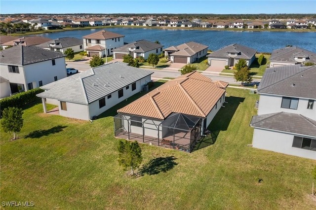 bird's eye view with a water view