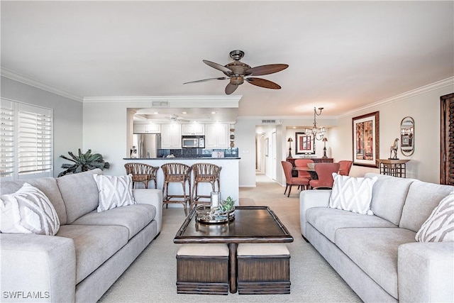 living room with crown molding, light carpet, and ceiling fan with notable chandelier