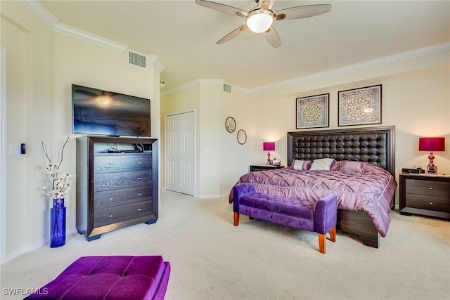 bedroom featuring light carpet, a closet, ornamental molding, and ceiling fan