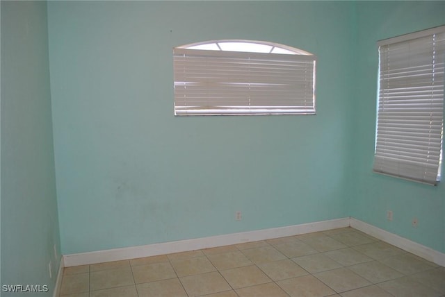 view of tiled spare room