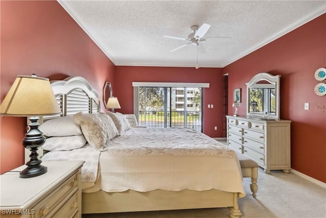 bedroom with crown molding, ceiling fan, access to exterior, a textured ceiling, and light colored carpet