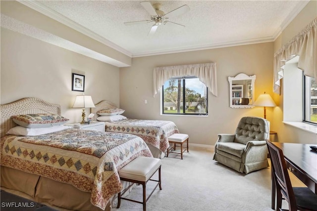 carpeted bedroom with ceiling fan, ornamental molding, and a textured ceiling