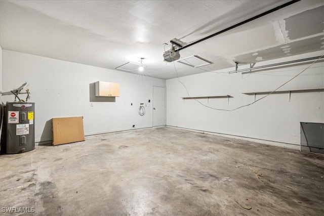 garage featuring water heater and a garage door opener