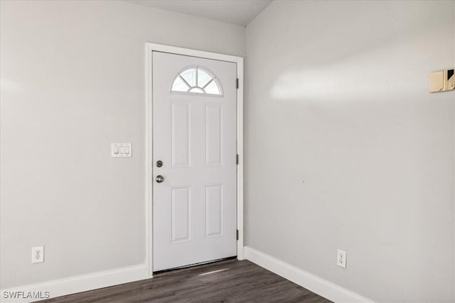 entryway with dark hardwood / wood-style floors