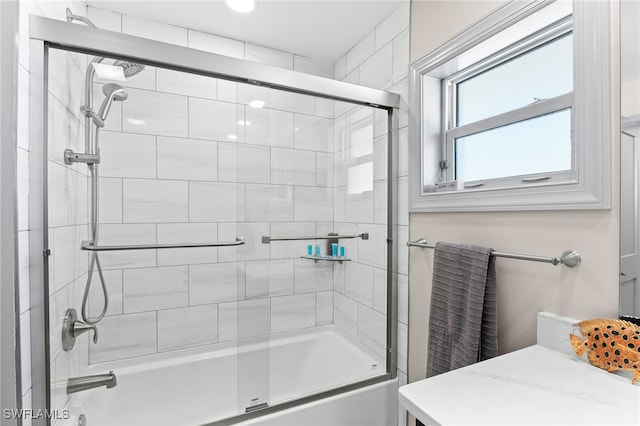 bathroom with enclosed tub / shower combo