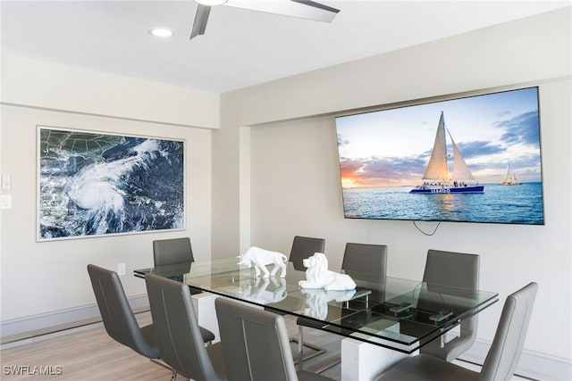 dining area with light hardwood / wood-style flooring