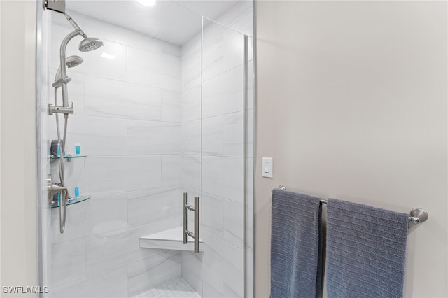 bathroom featuring an enclosed shower