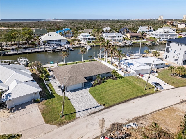 bird's eye view with a water view