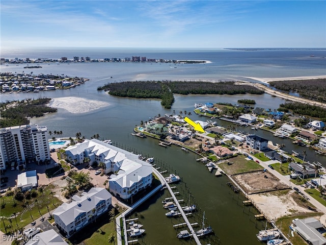 drone / aerial view with a water view