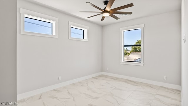 unfurnished room with ceiling fan