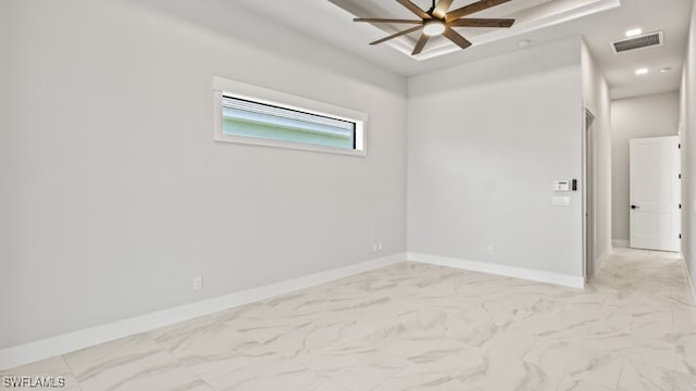 unfurnished room with ceiling fan