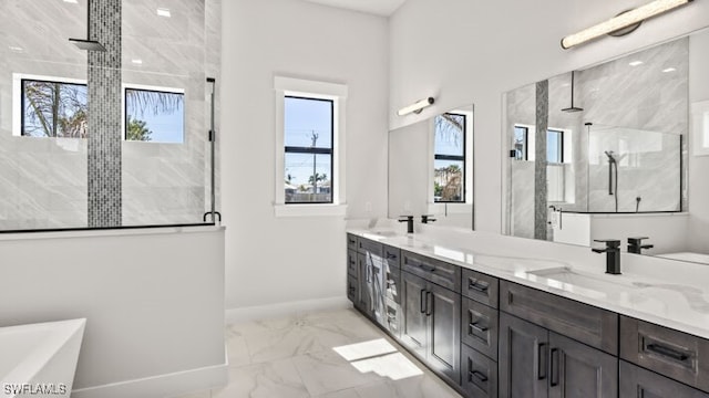 bathroom featuring plus walk in shower and vanity