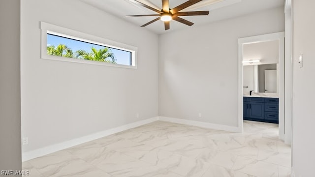 spare room with ceiling fan