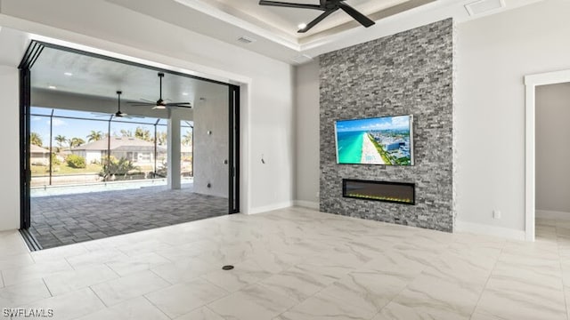 unfurnished living room with a stone fireplace