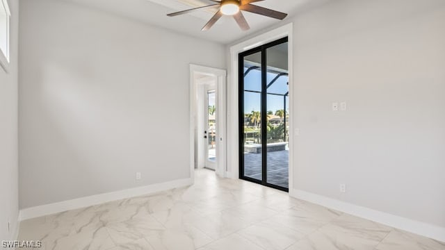 unfurnished room featuring ceiling fan