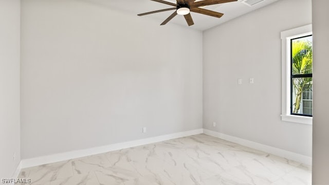 spare room with ceiling fan