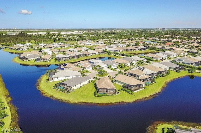 aerial view featuring a water view and a residential view