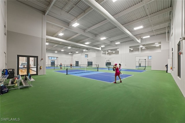 view of tennis court featuring basketball court