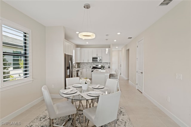 view of tiled dining area