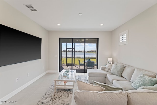 living room with light tile patterned flooring