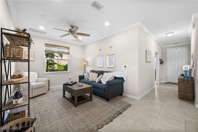 tiled living room with ceiling fan and ornamental molding