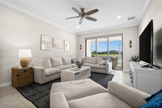 tiled living room with ceiling fan and crown molding