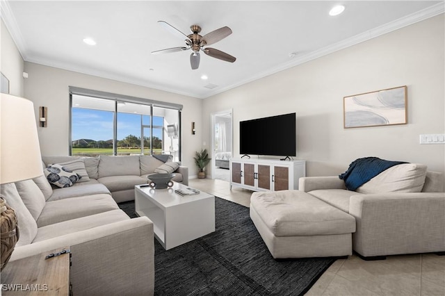 living room featuring tile patterned flooring, ceiling fan, and ornamental molding