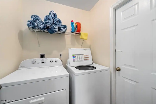 laundry area with washer and clothes dryer