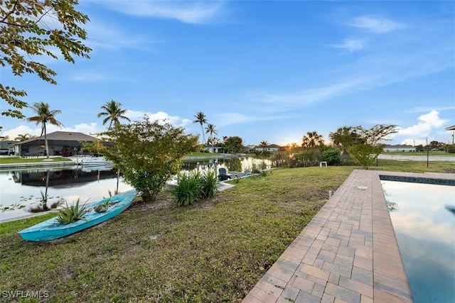 view of yard with a water view