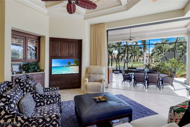 tiled living room with a wealth of natural light, crown molding, and ceiling fan