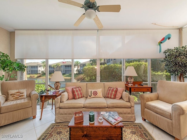 sunroom with plenty of natural light and ceiling fan