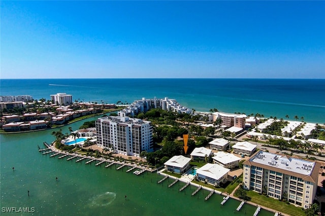 aerial view featuring a water view and a city view