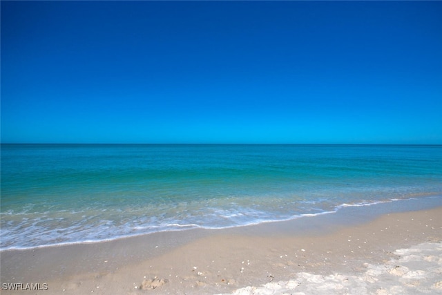 view of water feature featuring a beach view