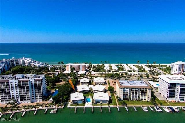 bird's eye view with a water view and a city view