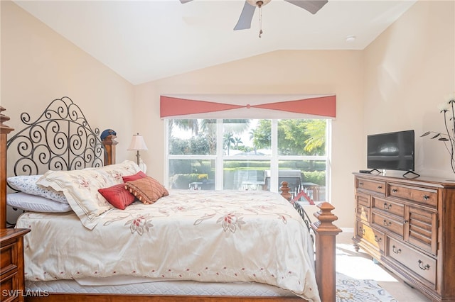 bedroom with lofted ceiling and ceiling fan