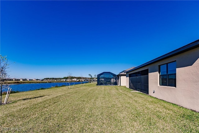 view of yard with a water view