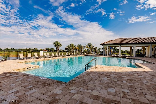 view of swimming pool featuring a patio