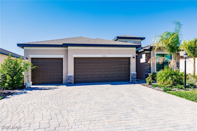 prairie-style home with a garage