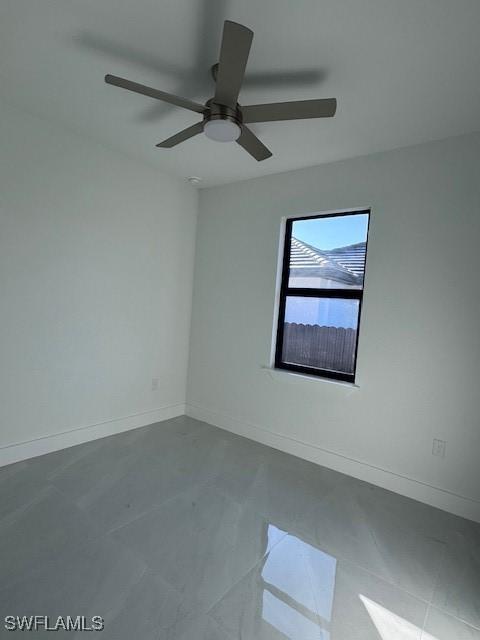 empty room with ceiling fan