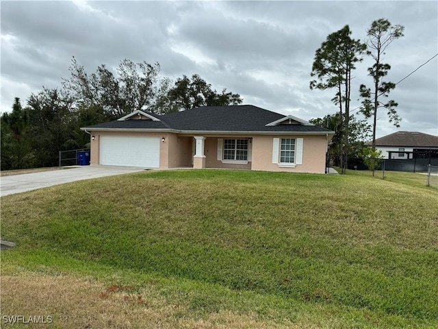 ranch-style house with a garage and a front lawn