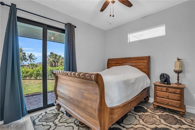 bedroom featuring access to exterior and ceiling fan