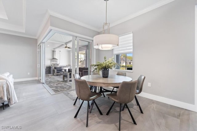 dining area with ornamental molding