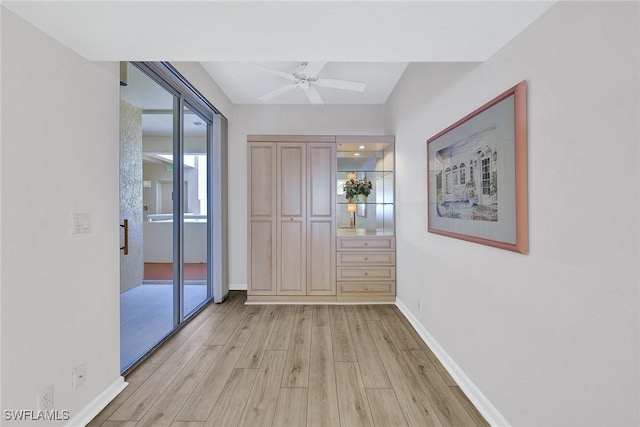 990 Cape Marco Dr Unit 1102, Marco Island, FL 34145 - unfurnished room featuring light wood finished floors, ceiling fan, and baseboards