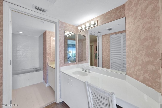 bathroom with radiator heating unit and vanity