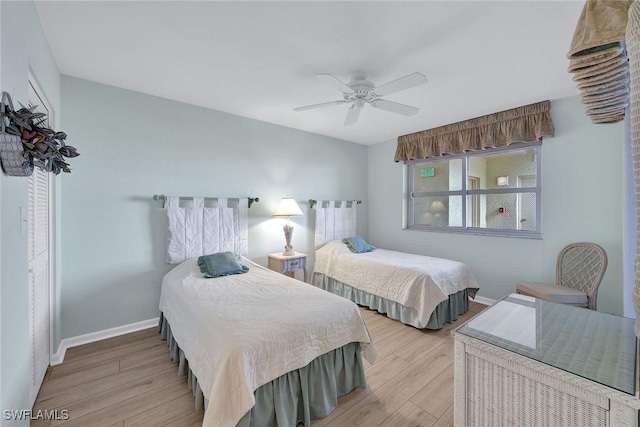 990 Cape Marco Dr Unit 1102, Marco Island, FL 34145 - bedroom with wood finished floors, baseboards, and a ceiling fan