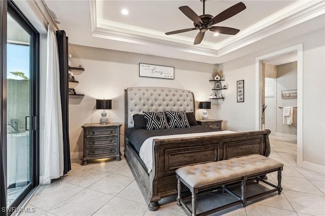 bedroom featuring ensuite bathroom, crown molding, ceiling fan, and a tray ceiling